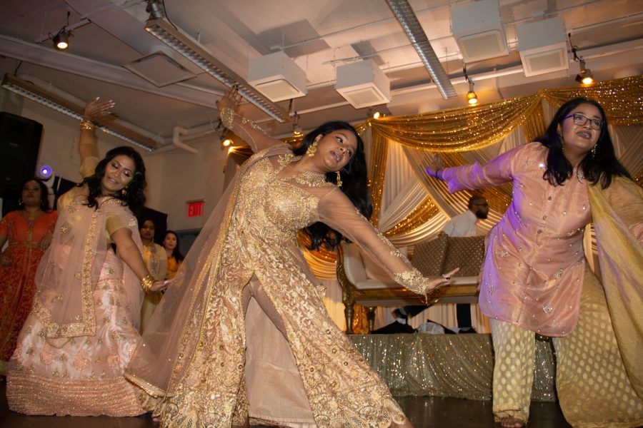 Wendy He | The TickerFormer Undergraduate Student Government President Radhika Kalani and former International Student Organization President Richard Rudman tied the knot at BSAs fourth annual Mock Wedding and cultural event.
