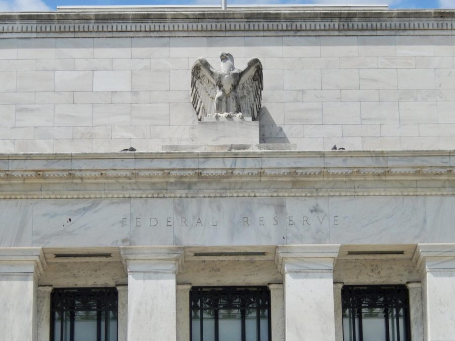 Banks fall, but Federal Reserve raises interest rates again